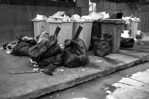 Waste removal truck collecting garbage in Waltham Forest